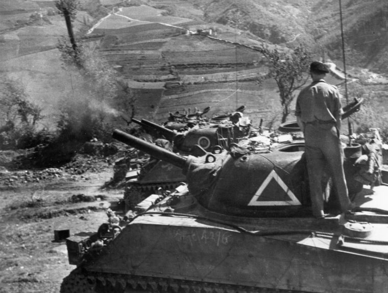6th South African Armoured Division M4 Shermans firing at Monte Sole during the breakthrough to Bologna, April 1945. After early victories in North Africa, the South African contingent was kept in reserve until after the fall of Rome, June 4, 1944. The men then really proved their mettle.