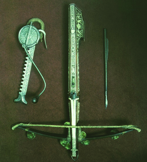 A Polish medieval crossbow of the 17th century, with a cranequin and one of its bolts.