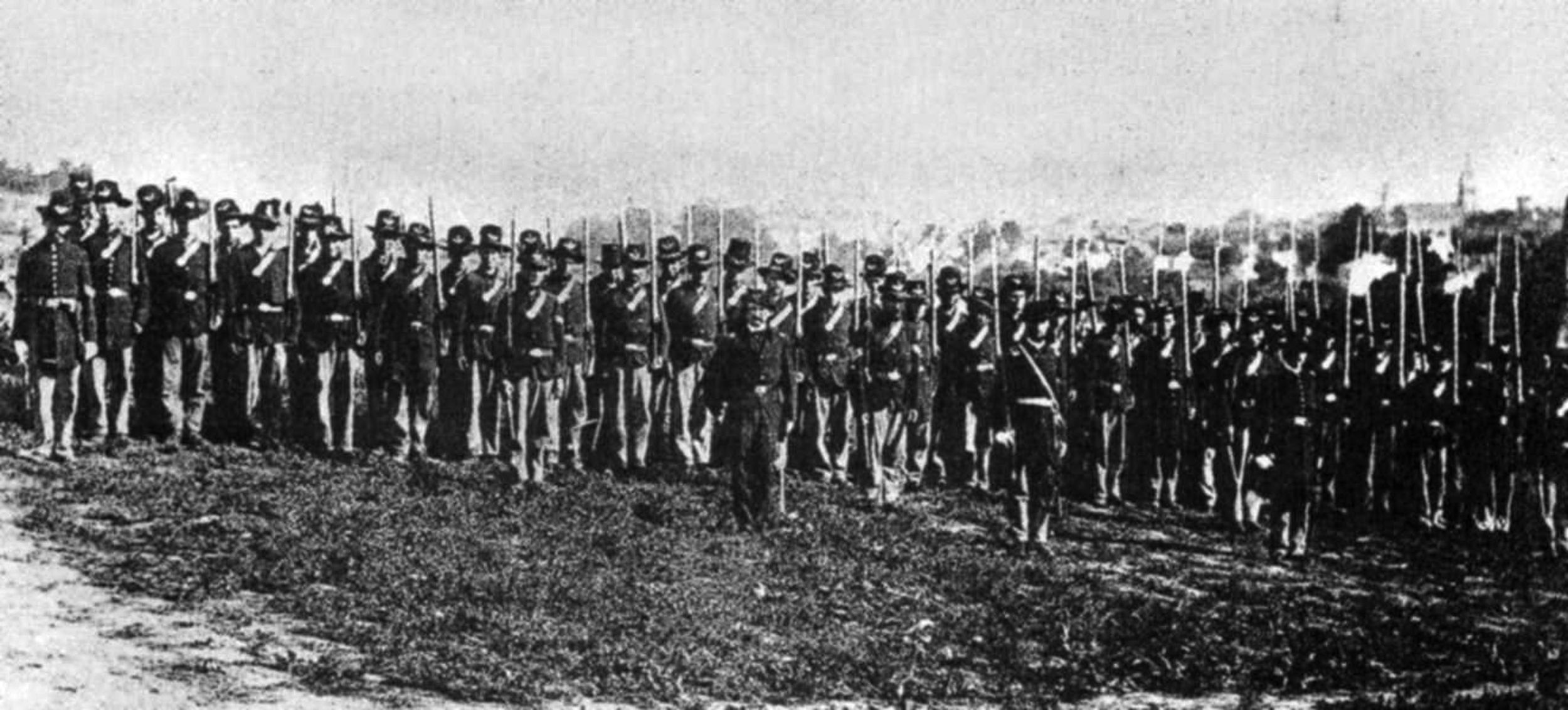 Members of the 7th Wisconsin Infantry Volunteer Regiment proudly wear the black Hardee hats issued to them to create a sense of esprit de corps.