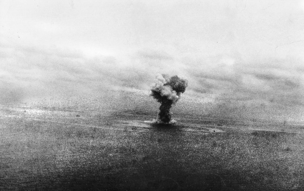 The Yamato explodes after receiving massive bomb and torpedo damage from U.S. Navy carrier planes north of Okinawa, April 7, 1945. Her captain and nearly 2,500 sailors went down with her.