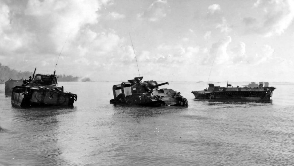 Some tanks and Buffalos never made it to shore. These were knocked out by intense Japanese fire. 