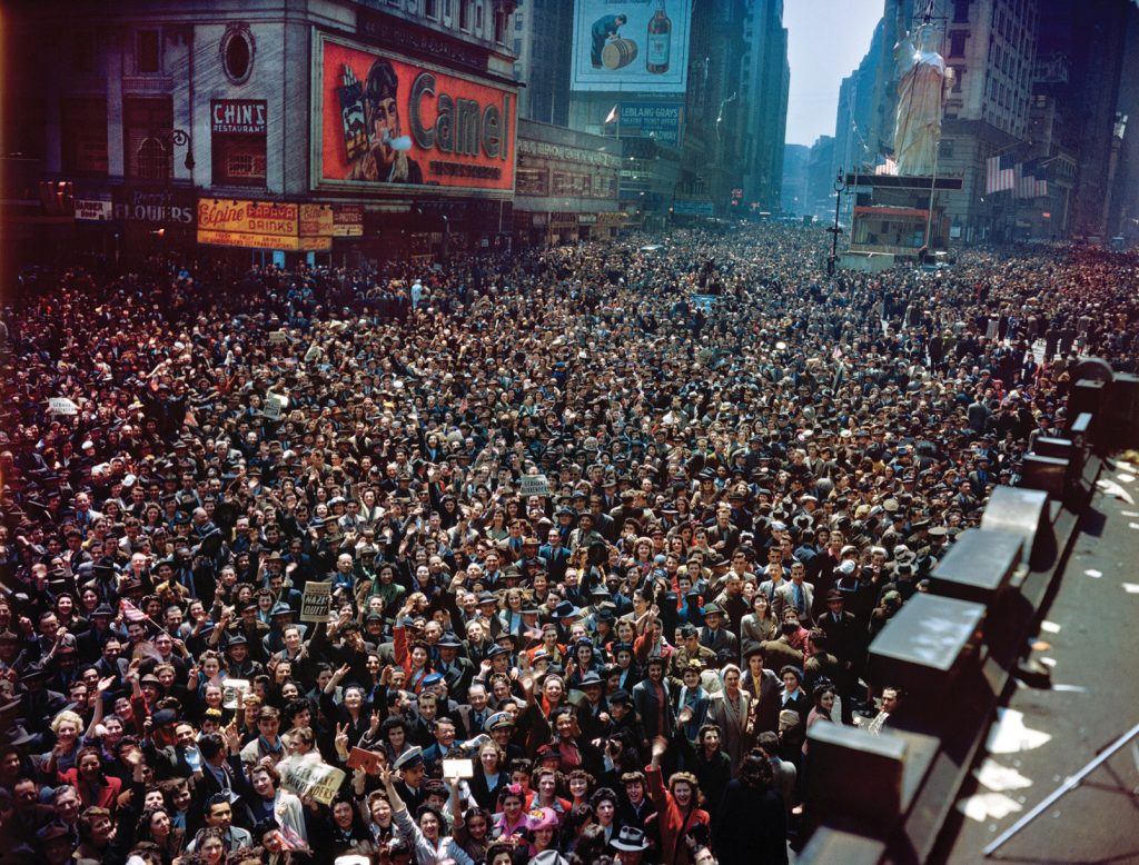 Two million joyful people fill Times Square in New York City to celebrate the defeat of Nazi Germany.