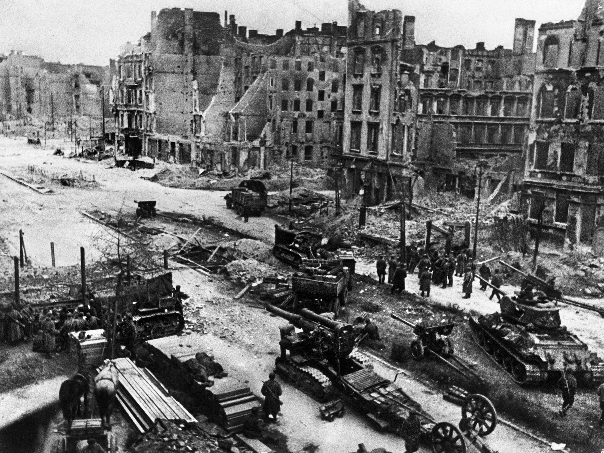 Soviet tanks and self-propelled artillery shown on Warschauer Strasse in the heart of Berlin after resistance had ended.