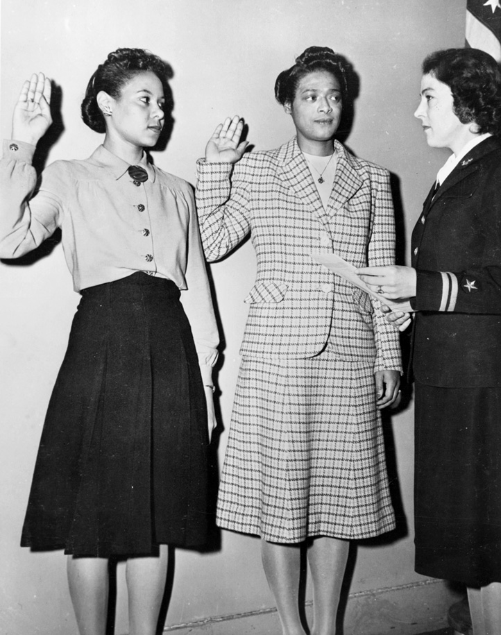 Francis Wills and Harriet Ida Pickens being sworn in as the first African American women to enlist in the Navy, and soon became the Navy’s first African American WAVE officers.
