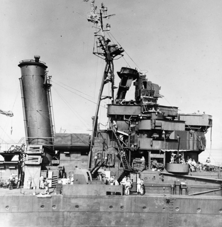 The Australian heavy cruiser HMAS Australia, showing damage incurred on October 21, 1944, was struck so many times by suicide pilots that she earned the nickname “the Kamikaze magnet.” She was never sunk, however.