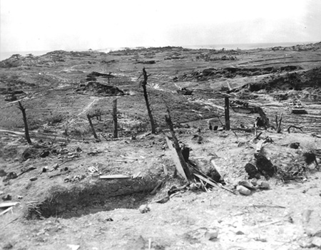 View from destroyed Japanese positions atop 75-foot-high Sugar Loaf, scene of the bloodiest fighting on Okinawa, where a single regiment inflicted over 2,600 casualties on attacking Marines.
