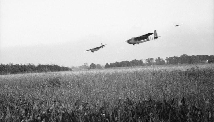 Hamilcar gliders of the British 6th Airborne Division land near the town of Ranville, France, on June 6, 1944. These gliders are carrying Tetrarch light tanks to support the offensive operations of the airborne troops.