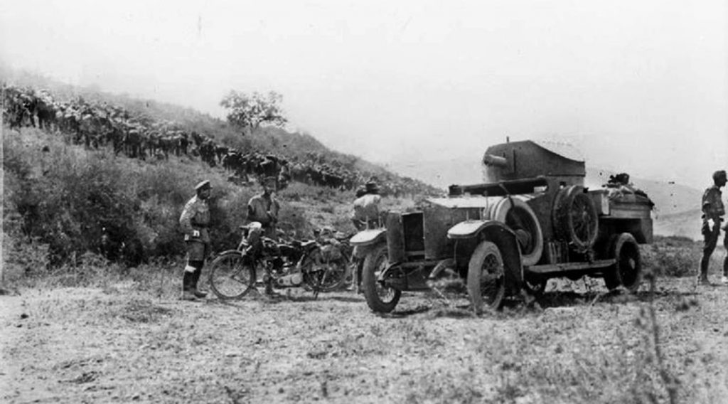A British light armored car patrols the rugged hills north of Samaria. 