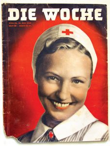 A magazine called Die Woche (The Week) featured a smiling German Red Cross worker on the cover of one of its issues.
