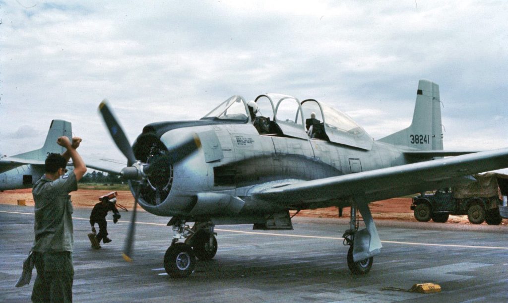 Flown by both Thai and Laotian pilots during the Laotian Civil War, the North American T-28D Nomad counter-insurgency aircraft eventually became too vulnerable to survive communist antiaircraft defenses along the Ho Chi Minh Trail in southern Laos, but it continued to play a crucial role against communist forces in northern Laos.