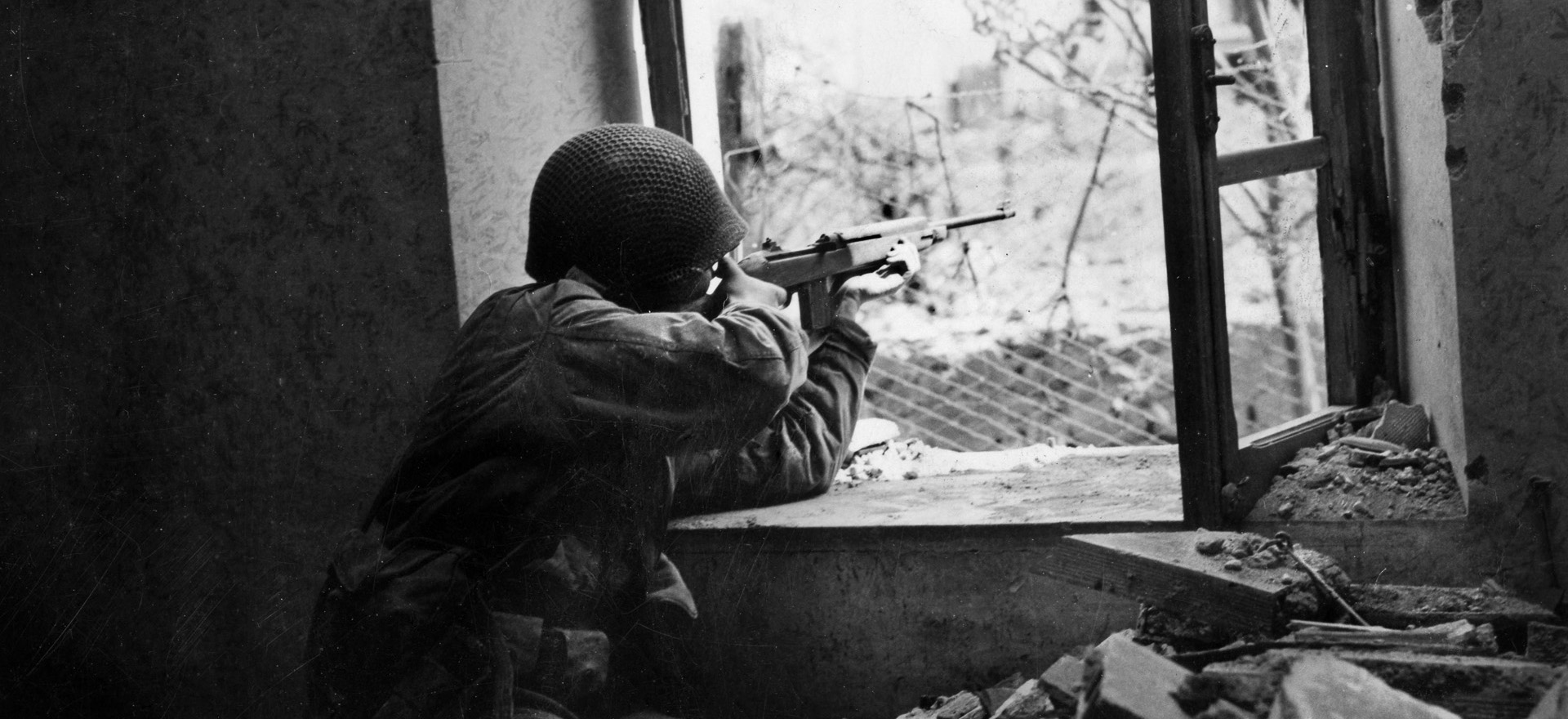 From urban combat to fighting in flat, open fields, from tank-vs.-tank duels, to aerial bombardments to ceaseless artillery barrages, the action at Anzio took on every dimension. Here an American GI uses his carbine to keep German forces at bay during the battle for Anzio that lasted from January to May 1944.