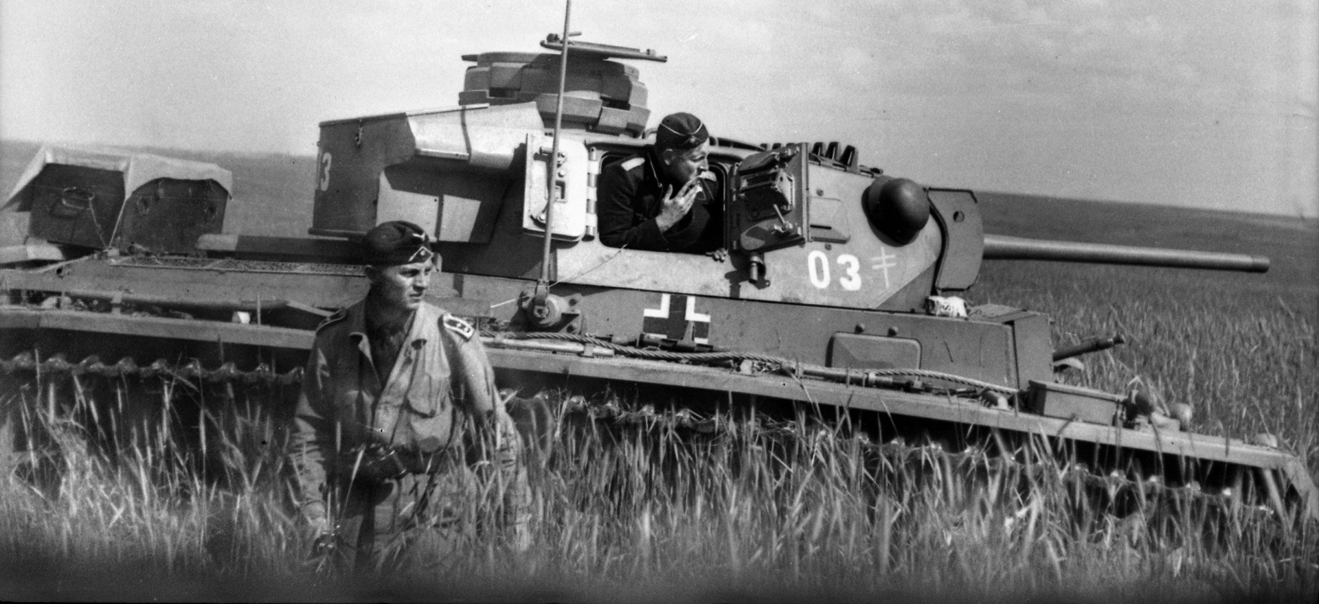 A German tanker stands on the Russian steppe near Voronezh after emerging from the turret of his PzKpfw. III tank. In the summer of 1942, Hitler mounted an armored thrust to the south along the Eastern Front, and it led to ruin.