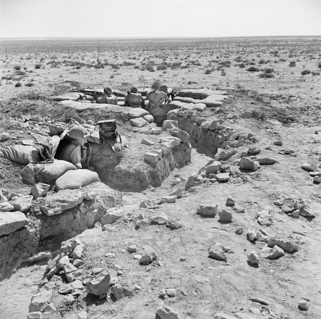 Tough Australian soldiers man frontline trenches on the defensive perimeter at Tobruk.