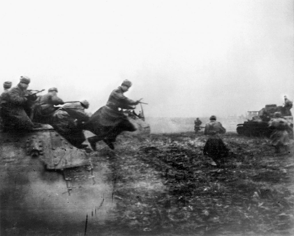 A squad of Red Army machine gunners leap from tanks in an effort to halt the German advance. Soviet losses were heavy but Hitler soon called a halt to the successful Operation South Wind to mount another—Operation Spring Awakening—an attempt to secure vital oil reserves in Hungary that proved to be a failure.