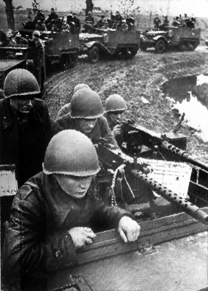 Driving American halftracks and armed with U.S. American machine guns, Soviet troops roll toward the front, January 1945.