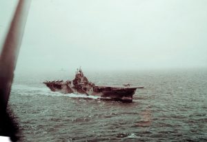 USS Intrepid, photographed by Richard Shipman from the rear seat of a Helldiver SB2C while taking off to attack the Japanese fleet. Intrepid and USS Cabot launched the first planes against the Japanese at 10:26 am.