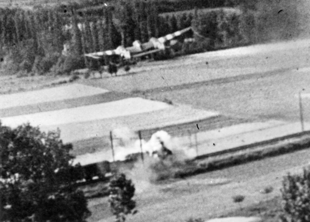 First Lieutenant James F. ‘Jim’ Byers of the 430th Fighter Squadron completes a strafing run against a locomotive pulling freight cars laden with supplies intended for German troops somewhere in France.