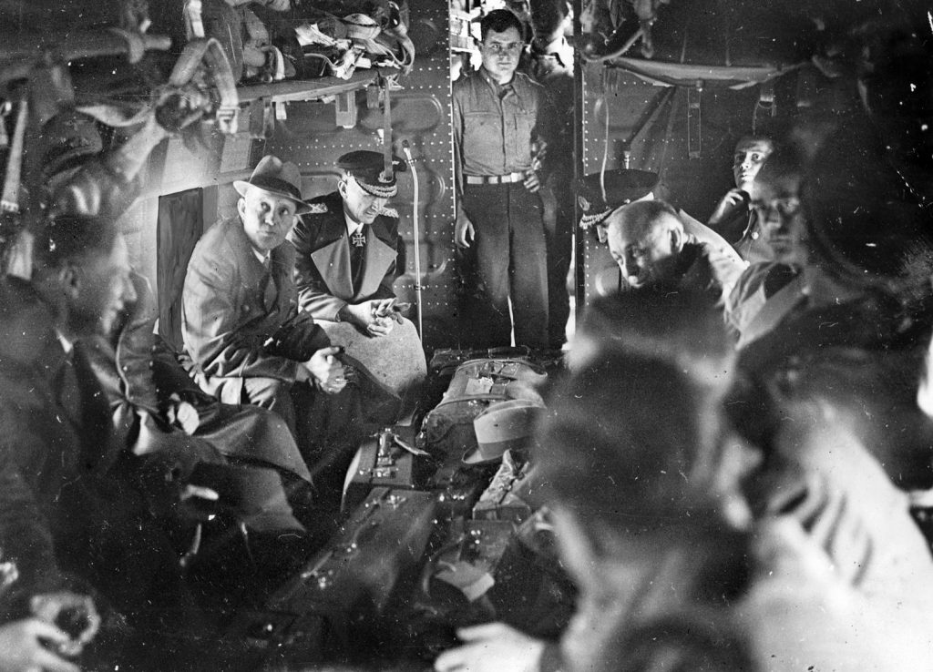 Admiral Karl Dönitz, left of the door, was the last Führer of the Third Reich. He was arrested along with other members of the Nazi government on May 23, 1945. The Nazis were subsequently flown to England and imprisoned to await trial on war crimes charges.