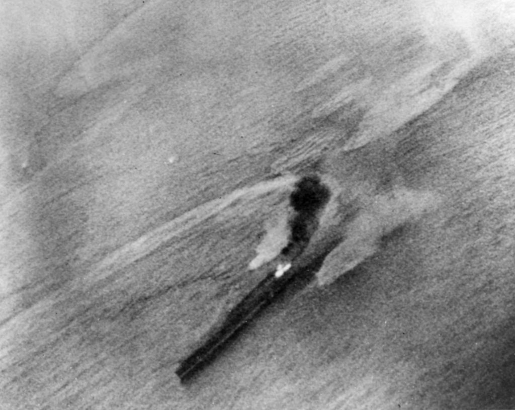 The Japanese aircraft carrier Chiyoda takes a bomb hit aft from an American plane during the late afternoon raid of June 20. 