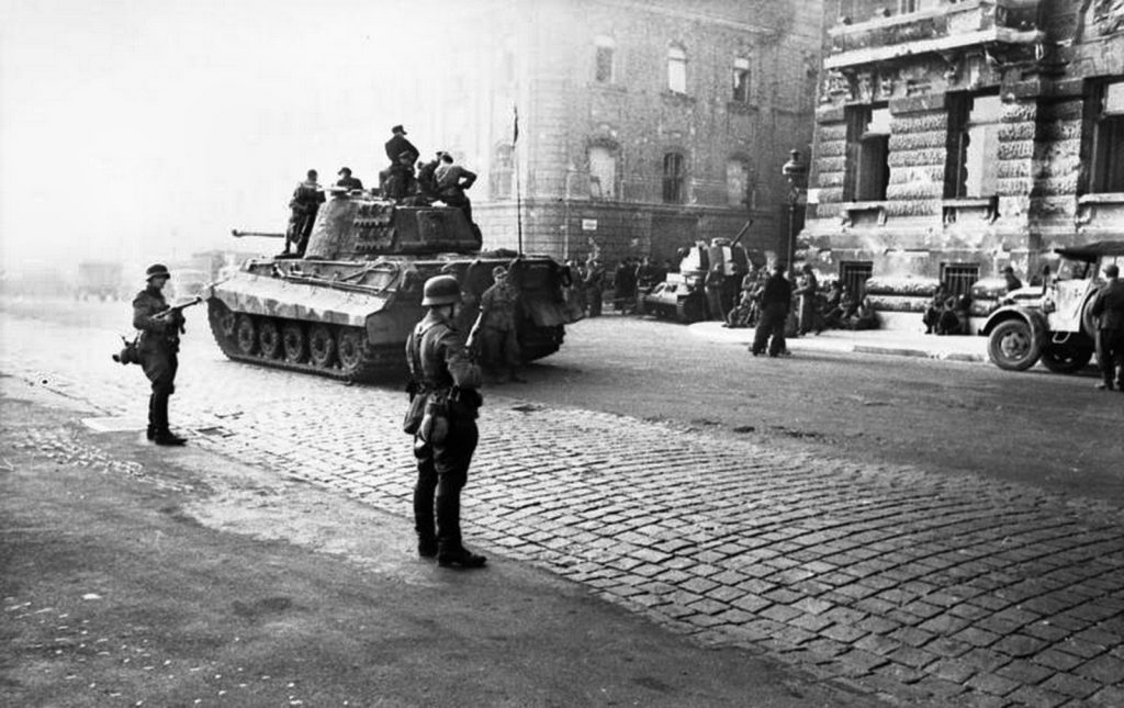 When Horthy put out peace feelers to the Allies, Hitler took action to execute a coup d’etat.  Skorzeny led Tiger II tanks and a contingent of German troops to the Vienna Gates at Castle Hill in Budapest, where the Germans took swift control of the Hungarian government.