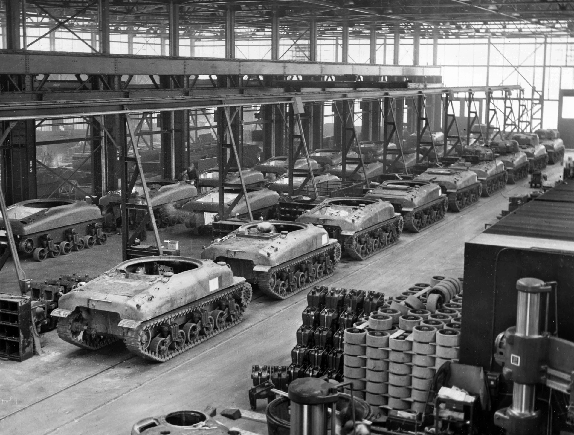 M4 Sherman tanks proceed down the assembly line at the Lima Locomotive Works in Ohio in 1942. The plant was the first to produce the Sherman, completing a total of 1,655 tanks during the war years.