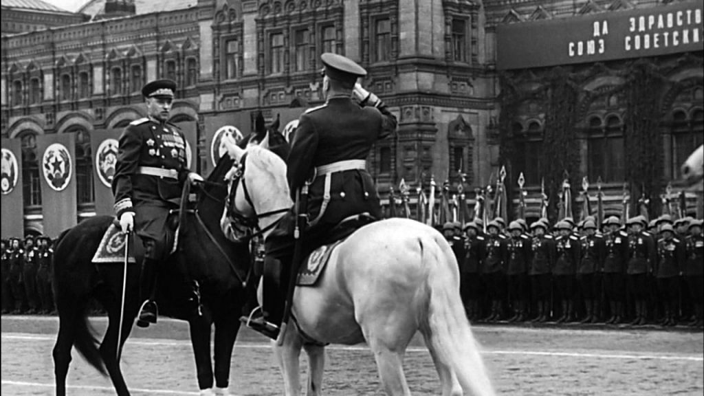 Marshal Rokossovsky (left) and Marshal Georgi Zhukov exchange military greetings during the victory parade in Moscow held in June 1945 to celebrate the defeat of Nazi Germany.