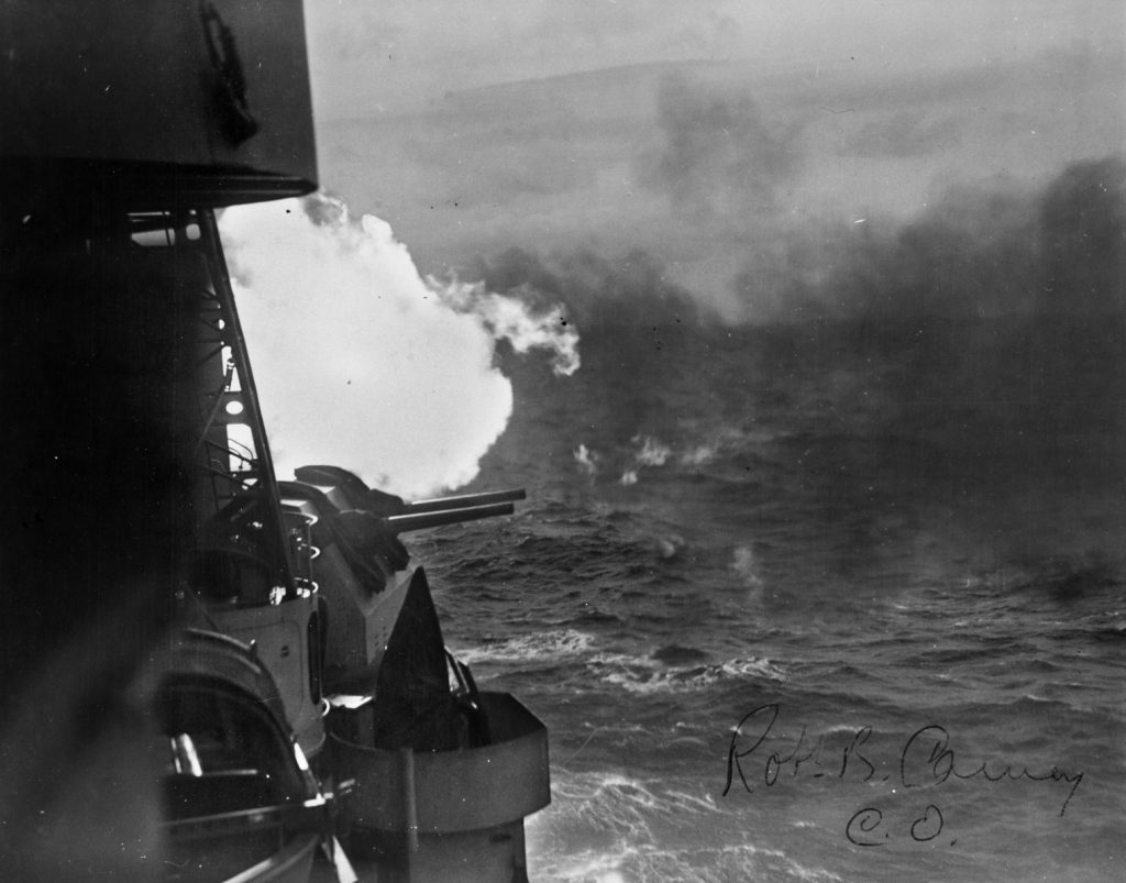Flames belch from USS Denver’s guns during a night battle in Kula Gulf, Solomon Islands, March 5-6, 1943. Four months later, Gwin would be sunk in the same Kula Gulf area.