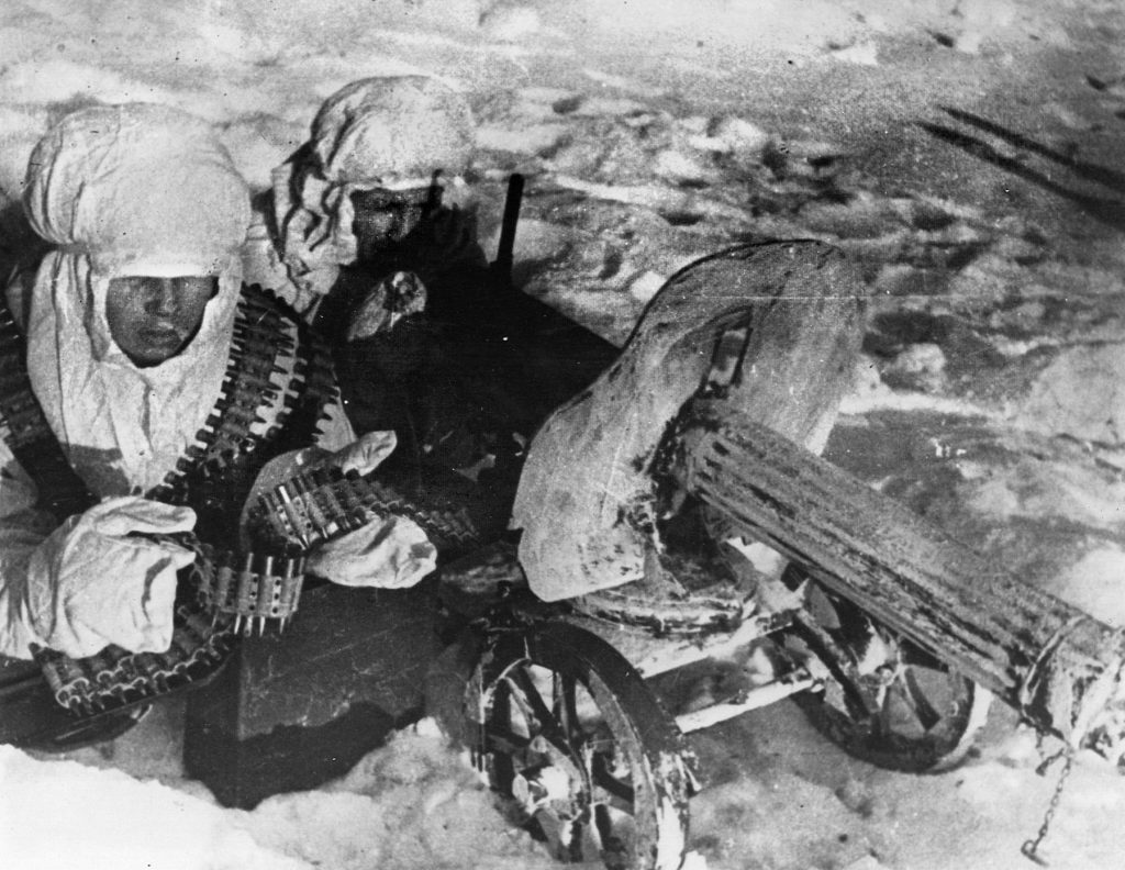 Two Russian artillerymen take position in the snow. With lack of air support due to foul weather, infantry and armor would play a major role in breaking German resistance on the southern front. 