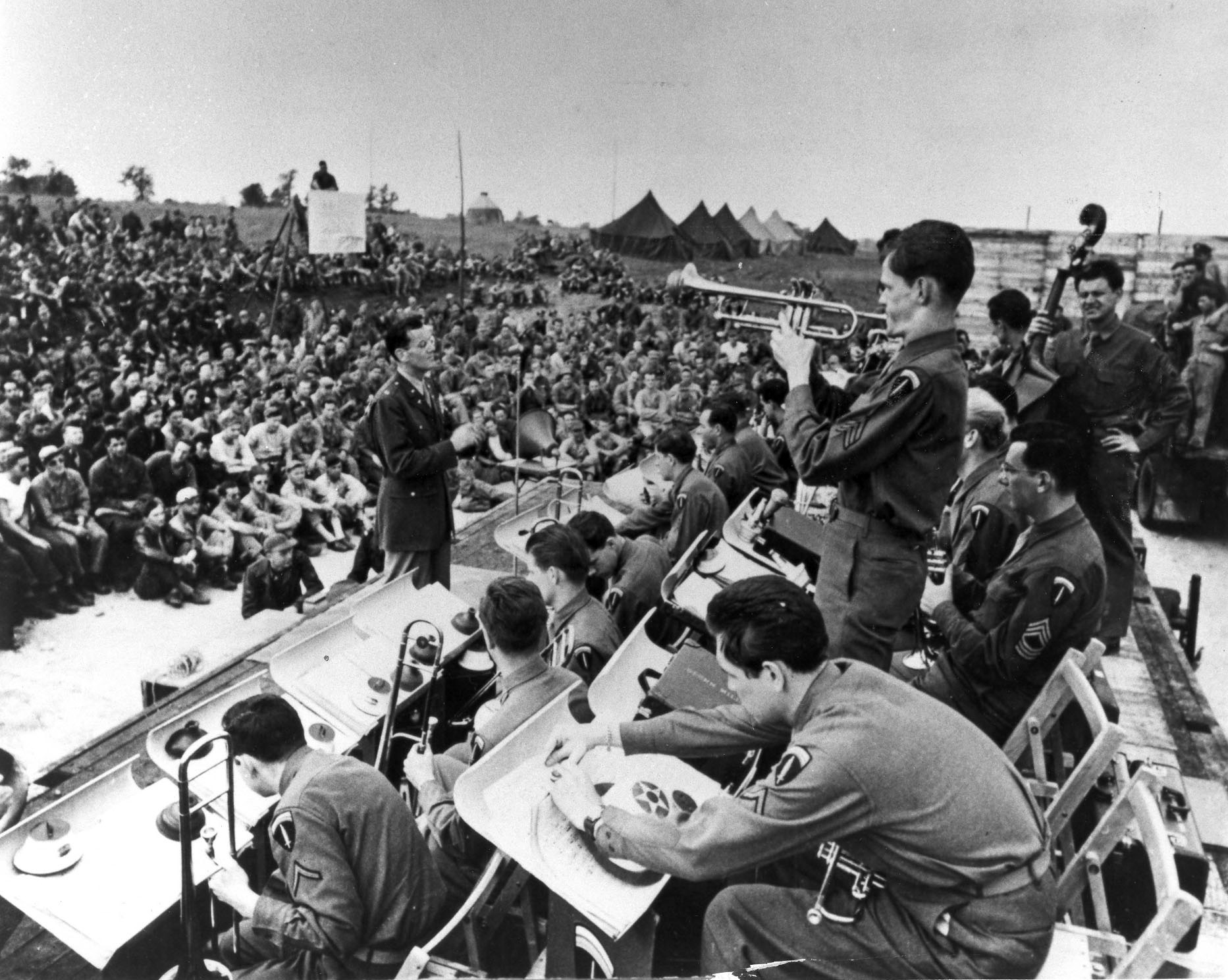 Popular bandleader Glenn Miller and his orchestra entertain a crowd in England in 1943.