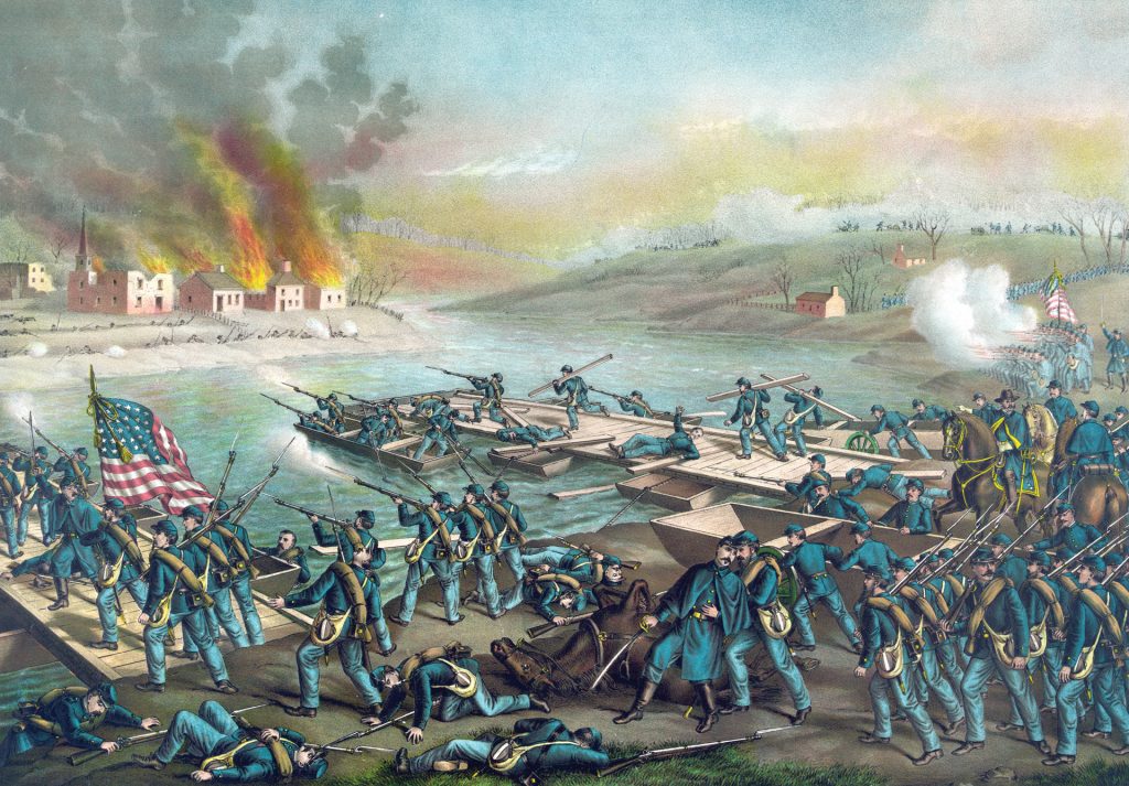 Union engineers work feverishly under fire from Confederates to complete two of the six pontoon bridges that allowed the Union troops to cross the Rappahannock River to engage Lee’s army.