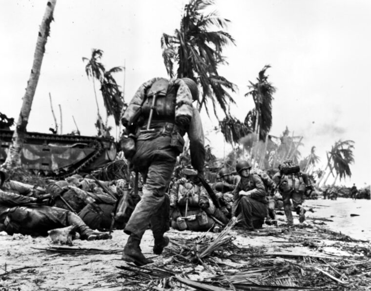 U.S. Marines from the 3rd Marine Amphibious Corps consolidate their positions along the shoreline during the Second Battle of Guam, July 21 to August 10, 1944. Whenever there was an enemy-held island in the Pacific that needed to be taken it was usually the U.S. Marine Corps that was called upon to take it.