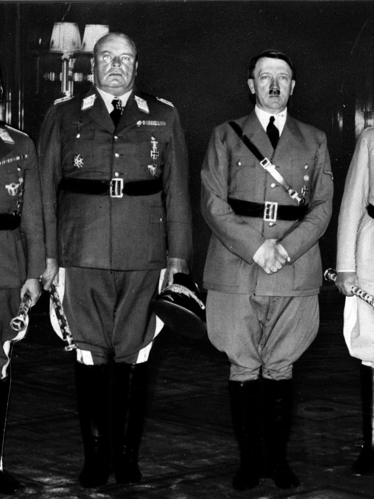 Hugo Sperrle stands stiffly beside his Führer. The ruthless Luftwaffe field marshal, who once held a variety of senior commands, was tried in 1947 but acquitted. He died a free man in 1953. 