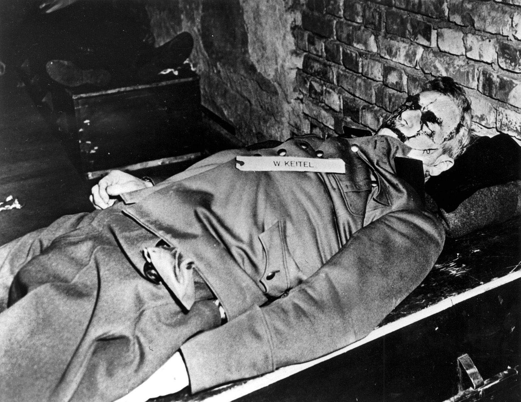 Post-mortem photo of Field Marshal Wilhelm Keitel. His bloodied face reportedly came from striking the edge of the opening in the gallows platform.