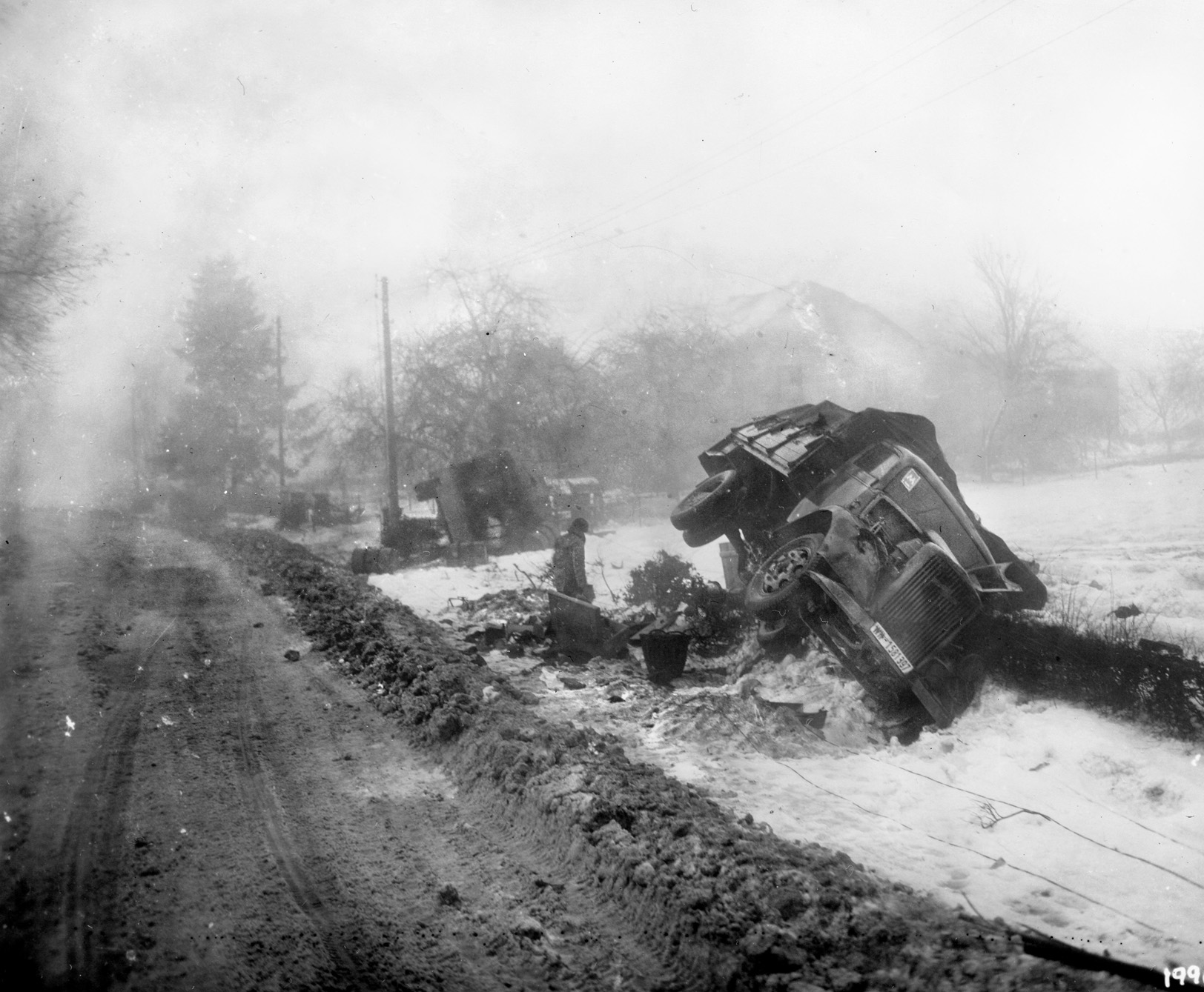 A Wehrmacht truck lies on its side—one of many German vehicles destroyed during the heavy fighting in Luxembourg. The Bulge was Nazi Germany’s last chance to stave off defeat in the West. 