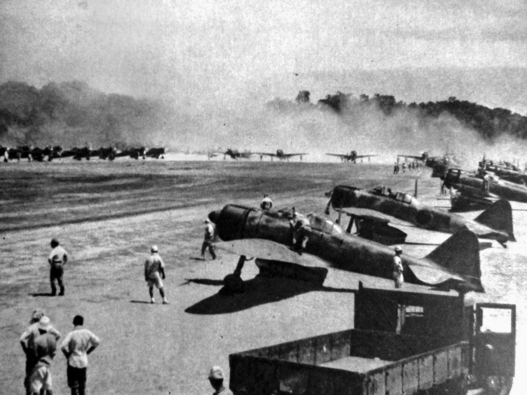  The great Japanese base at Rabaul on the island of New Britain is a beehive of activity as Mitsubishi A6M Zero fighters take off from their airstrip. Saburo Sakai left his base at Rabaul on the morning of August 7, 1942, as American Marines stormed ashore on Guadalcanal and nearly lost his life during vicious dogfights with American aircraft covering the landings.