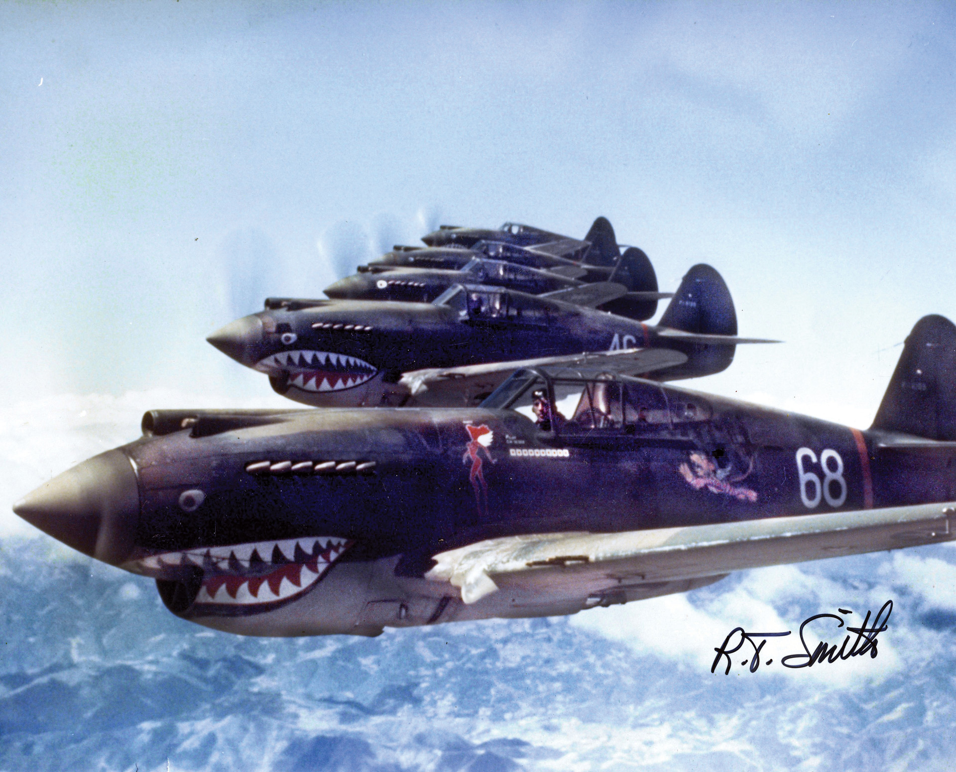 A squadron of Curtiss P-40 Kittyhawk fighters of the American Volunteer Group flies in formation near the Salween River Gorge on the border between China and Burma May 28,1942. 