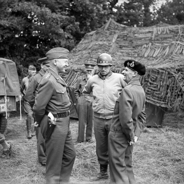 General George S. Patton Jr., left, assigned command of the fictitious First U.S. Army Group, jokes with Omar Bradley and Bernard Montgomery. Montgomery would command the D-Day ground forces.