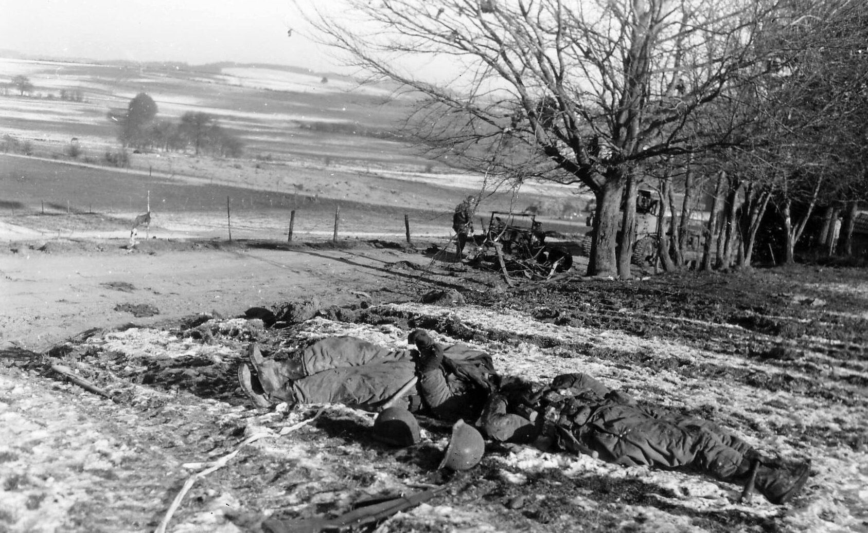 The fighting at Chaumont took a heavy toll in American lives. Here, two slain GIs lie in a snowy field. 