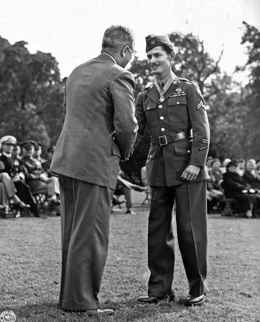 U.S. Army Corporal Desmond Doss receives the Medal of Honor from President Harry Truman. Doss served as a medic and saved many lives on Hacksaw Ridge.