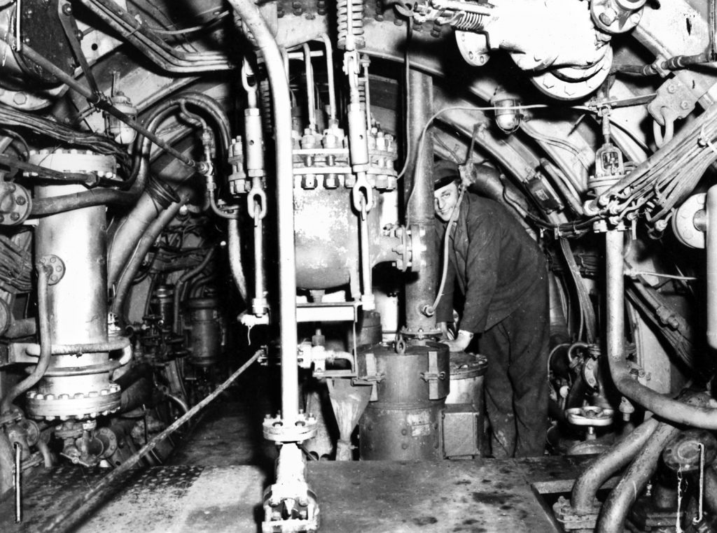 This image of the interior of a Walter type U-boat shows the machinery room with its specialized engine. This photo was one of a collection captured by Allied troops in the last days of World War II. 