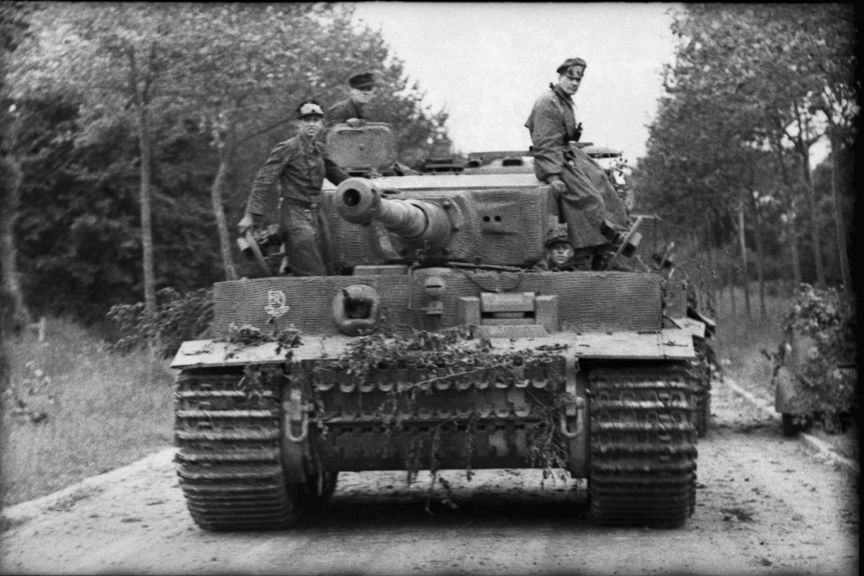 A German Tiger I tank rumbles along a road near Villers-Bocage, a key objective west of Caen. Two companies of Heavy Tank Battalion 101, a Waffen SS unit, on June 13 ambushed tank columns of the British 7th Armored Division.