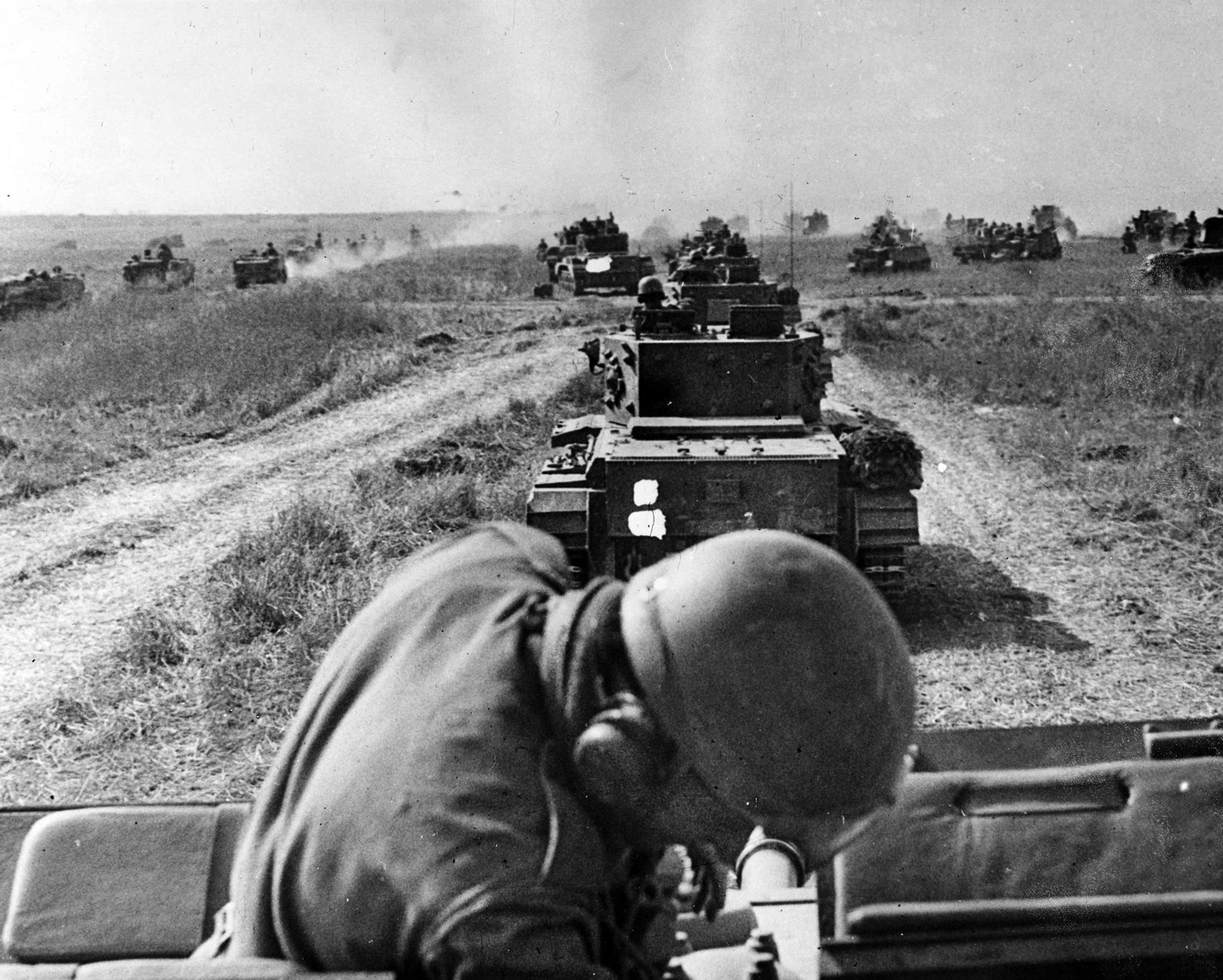 British armored forces advance against Hill 112 near Caen. A vicious battle with the 12th SS Panzer Division “Hitlerjugend” followed, and eventually Allied forces defeated the fanatical Nazi resistance. 