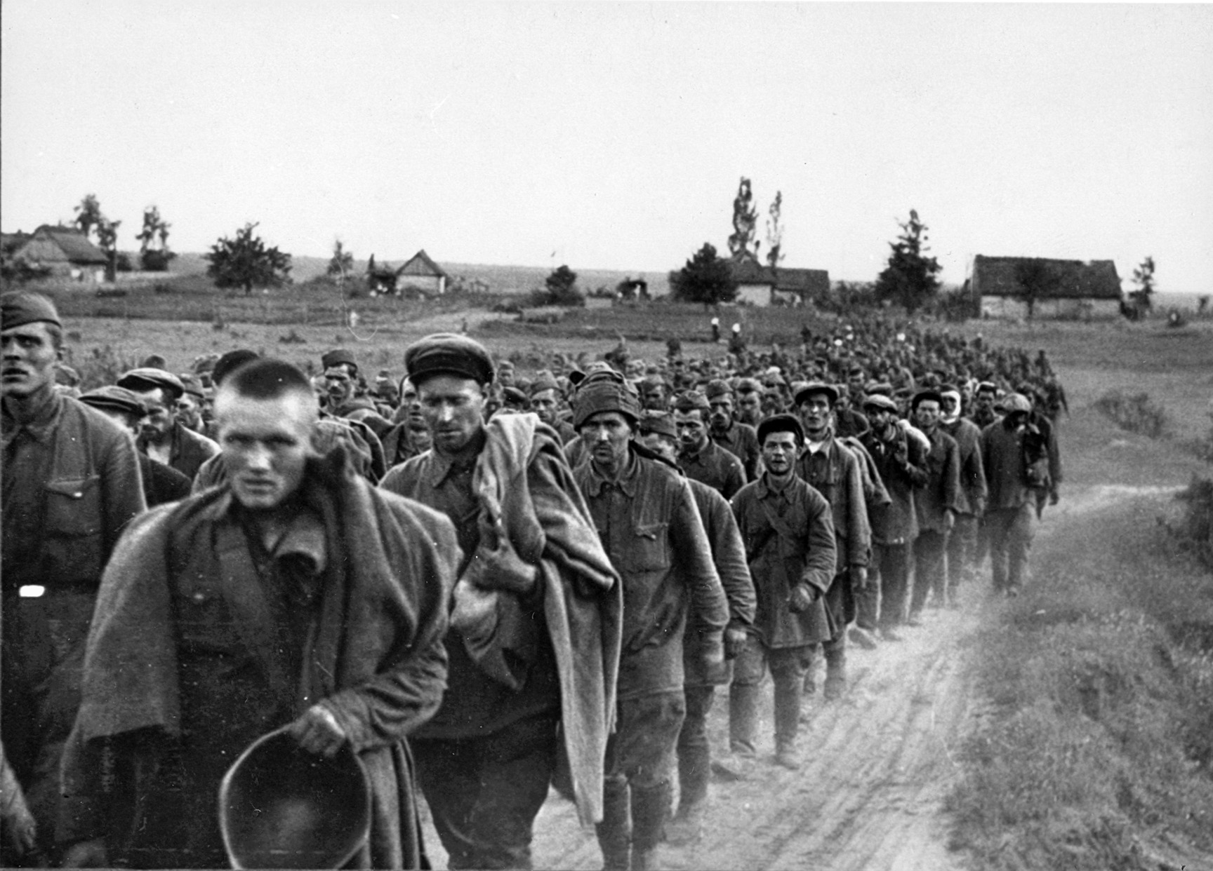 A long stream of Russian prisoners stretches into the distance in this image of the heady days of the German advance during Operation Barbarossa. German encirclements netted hundreds of thousands of prisoners before the Nazi juggernaut was halted.