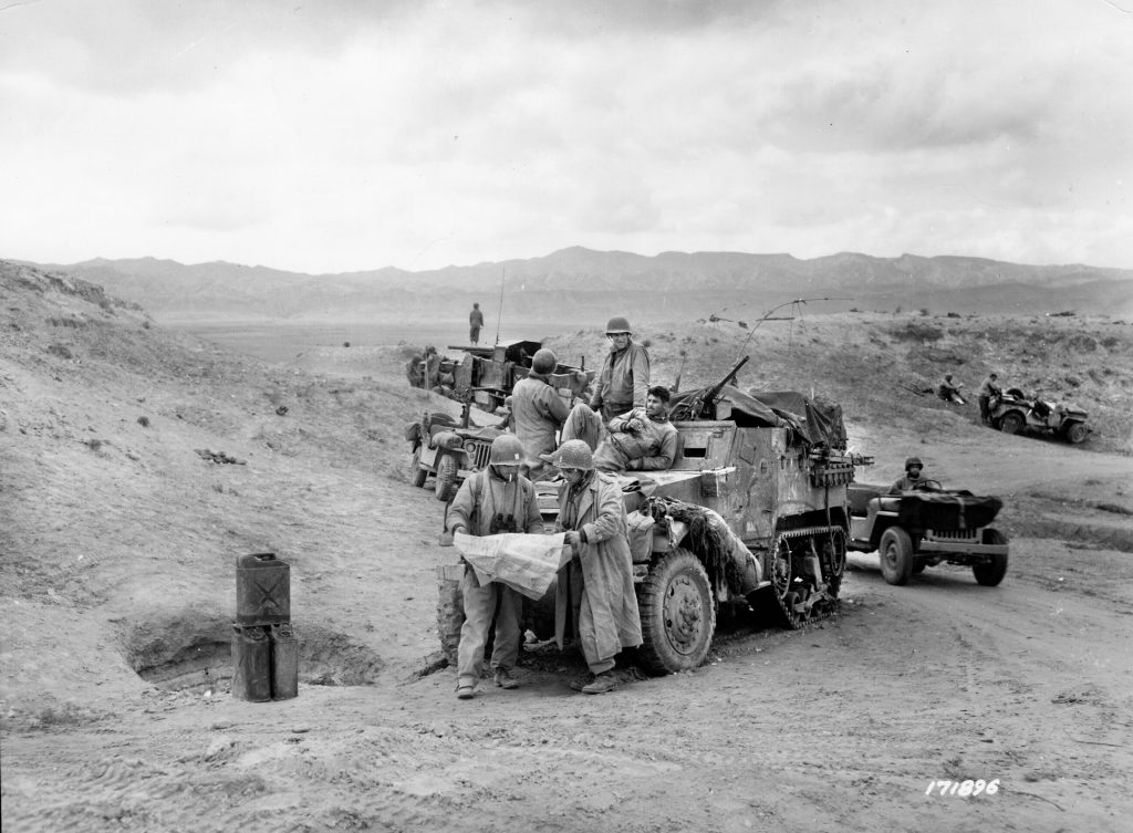 Officers of the 601st Tank Destroyer Battalion review a map near El Guettar on March 23, 1943. General Terry Allen added the battalion to his division at General George Patton’s recommendation. The unit played a key role in the coming battle.