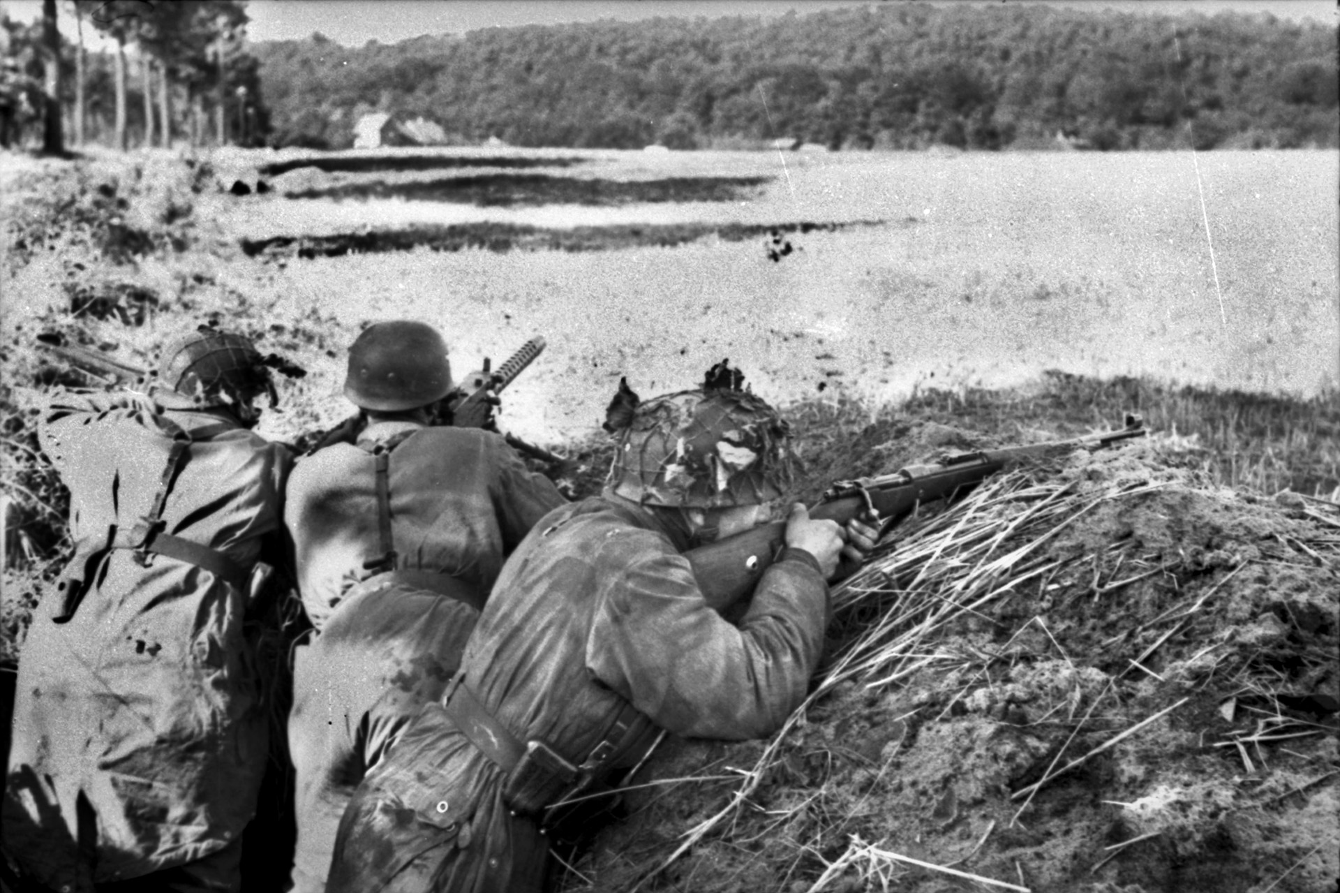 During the early stages of Operation Market-Garden, German paratroopers, or Fallschirmjager, are pictured manning defensive positions. The Fallschirmjager had a fierce reputation as highly trained combat troops, but many of them were killed or captured while fighting as infantry during Market-Garden.