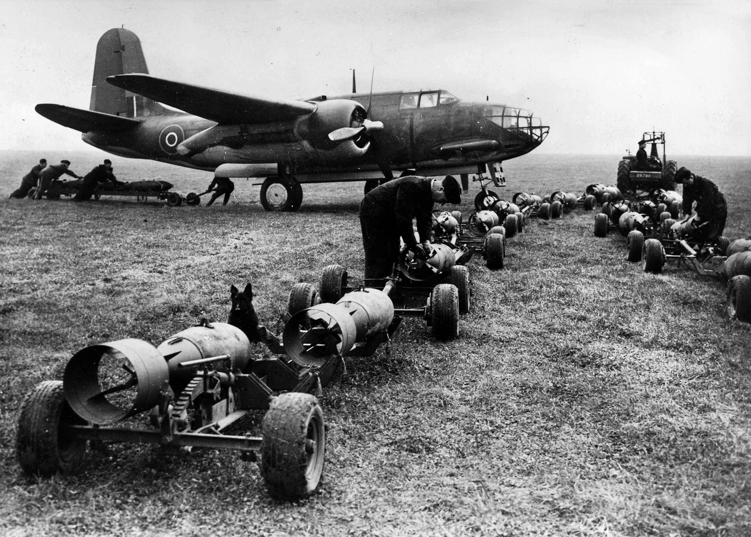 The British named the Douglas A-20 ‘Boston.’ In this photo Royal Air Force ground crewmen load bombs aboard a Boston prior to a mission. 