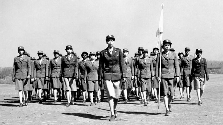 Major Charity Adams (center) commanded the 6888th Central Postal Directory Battalion, the only all-black, all-female Women’s Army Corps unit to serve overseas during World War II. PFC Romay Johnson remembered her as a strict officer.