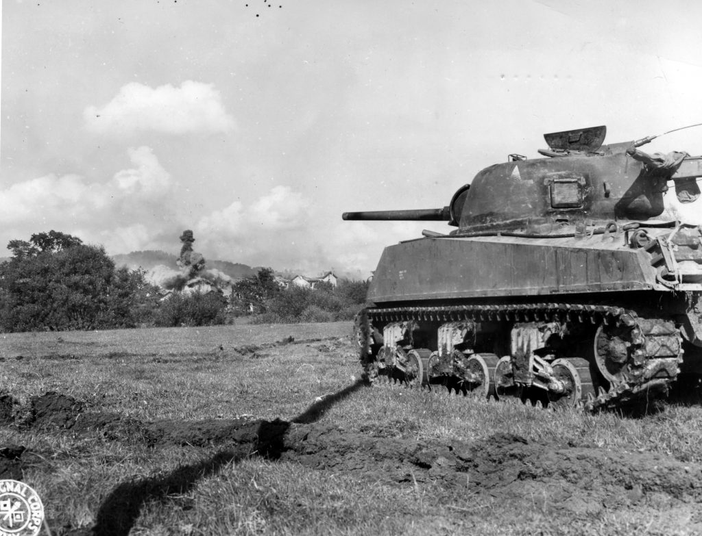 A Third Army M4 Sherman engages German targets with its 75mm cannon west of Arracourt in late 1944. 