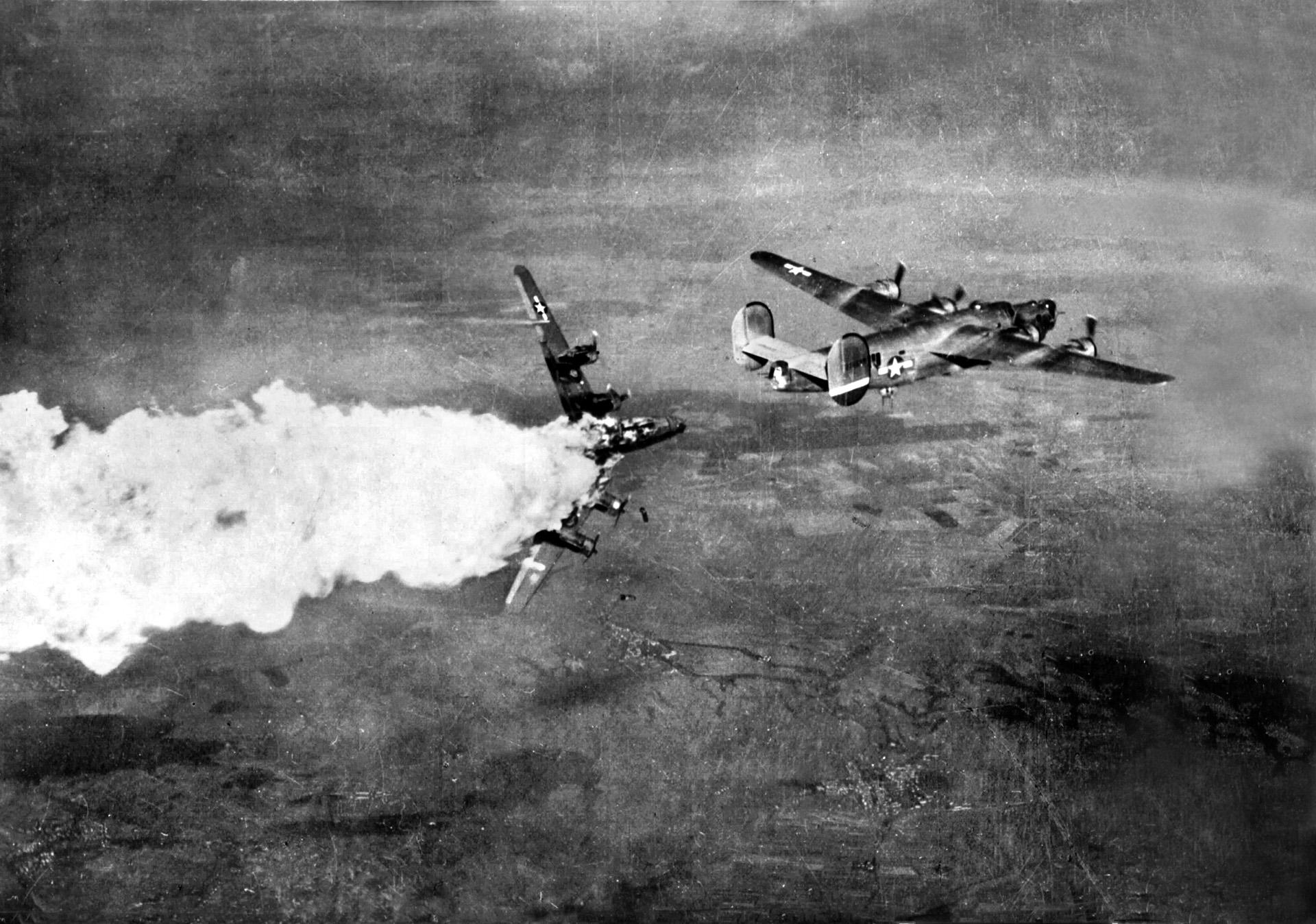 A Consolidated B-24 Liberator heavy bomber of the U.S. Army Air Forces disintegrates in a catastrophic explosion over Germany after a direct hit from flak batteries defending a target below. Senior American air commanders chose daylight bombing over the Royal Air Force’s preference for night raids, believing that accuracy would increase substantially. However, the tactic came at a tremendous cost.
