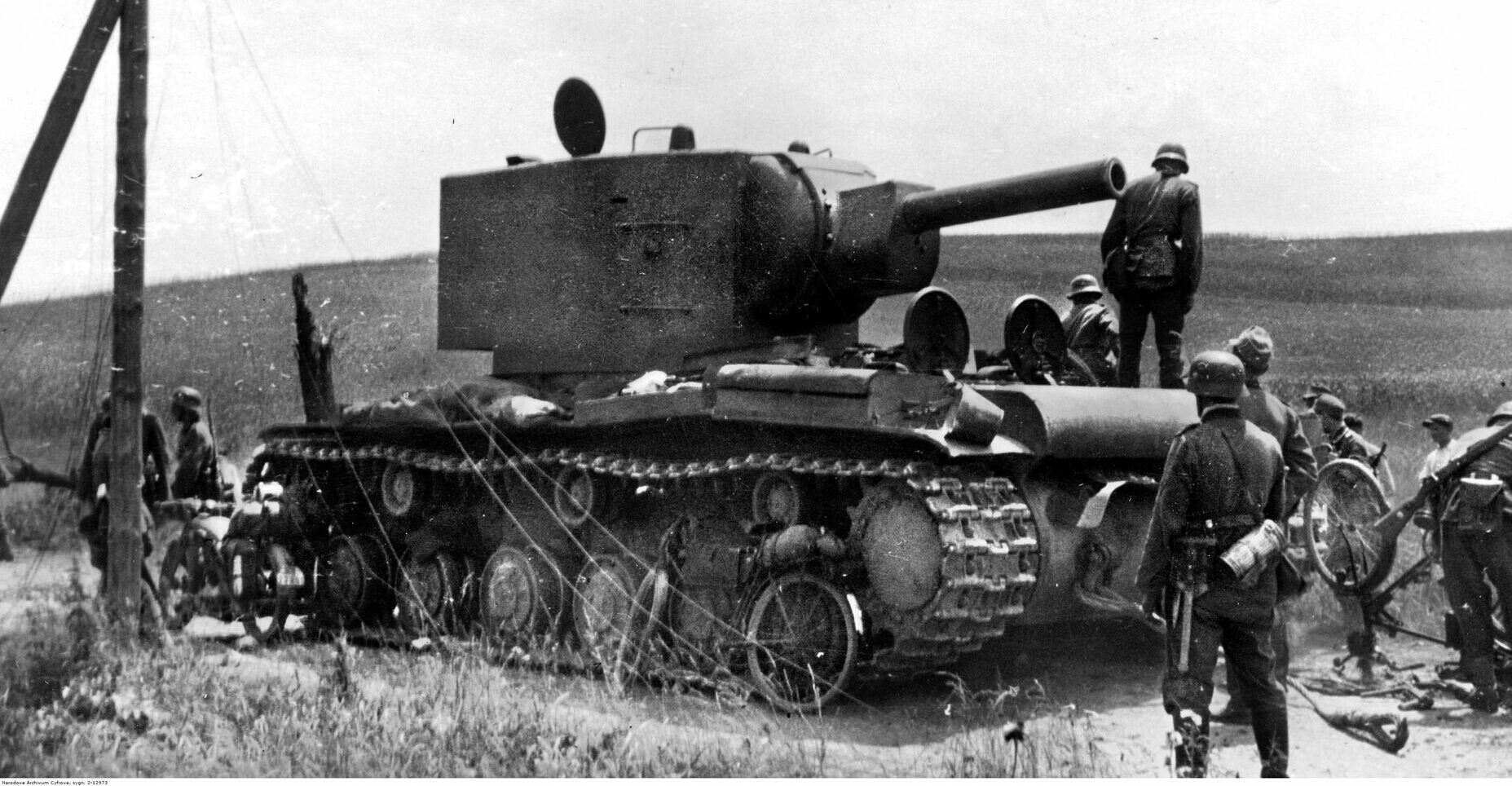 During a lull in the fighting on the Eastern Front, German soldiers take a moment to inspect a Soviet KV-2 heavy tank, which has been captured in battle. Although they considered their armor to be superior to anything fielded by the Red Army, the Germans were dismayed to encounter the heavy KV series tanks and the outstanding T-34 medium tank on the battlefield in the summer of 1941.